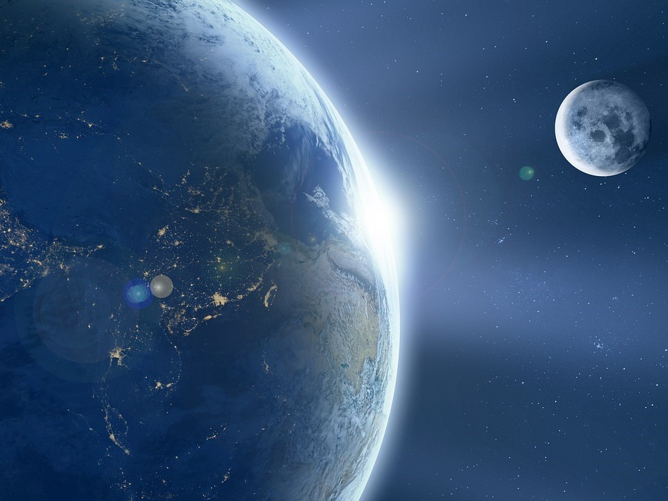 moon orbiting earth in space
