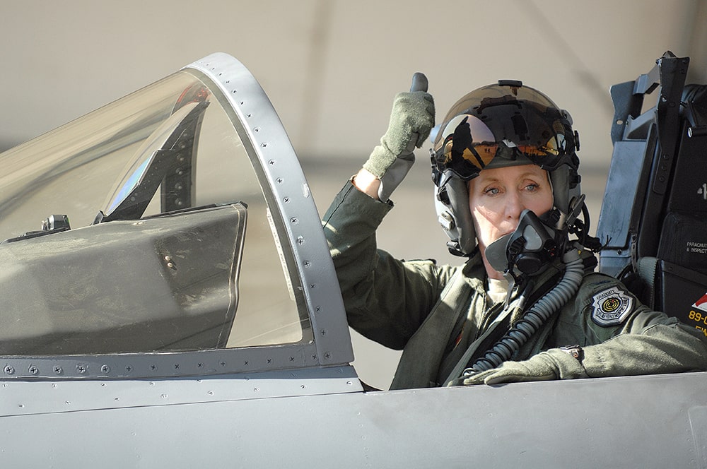 Cockrell School alumnus, Jeannie Leavitt, waving from an air force plane